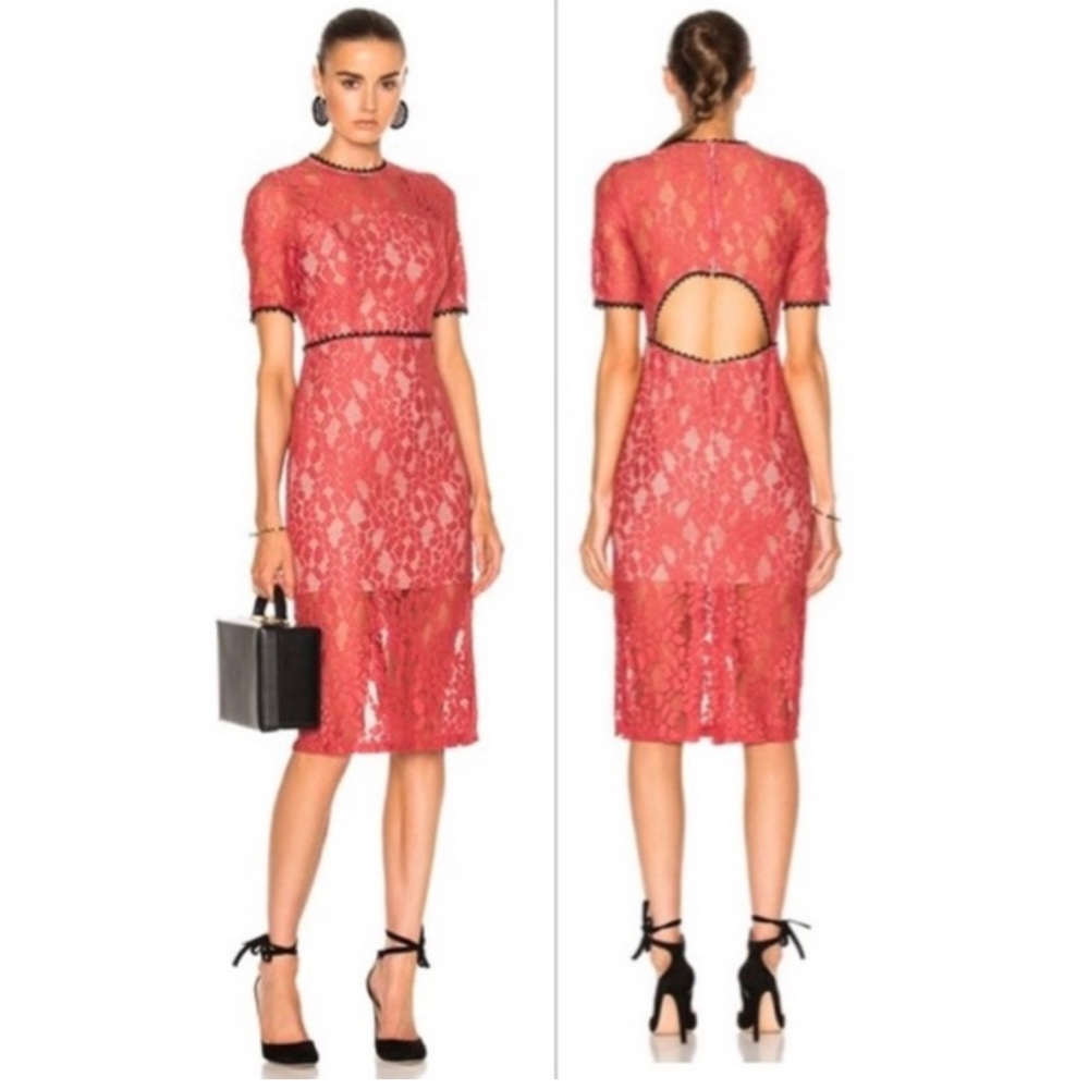 New with tags. Alexie lace dress with open back